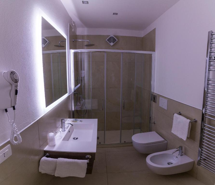 Koupelna v ubytování Hotel Tre Pini