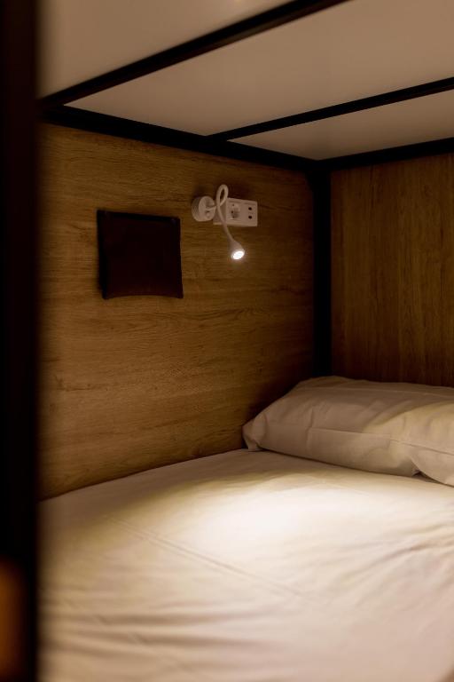 Postel nebo postele na pokoji v ubytování Hostel Nüt