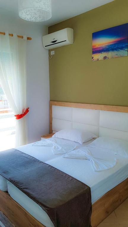 Postel nebo postele na pokoji v ubytování Brian Hotel