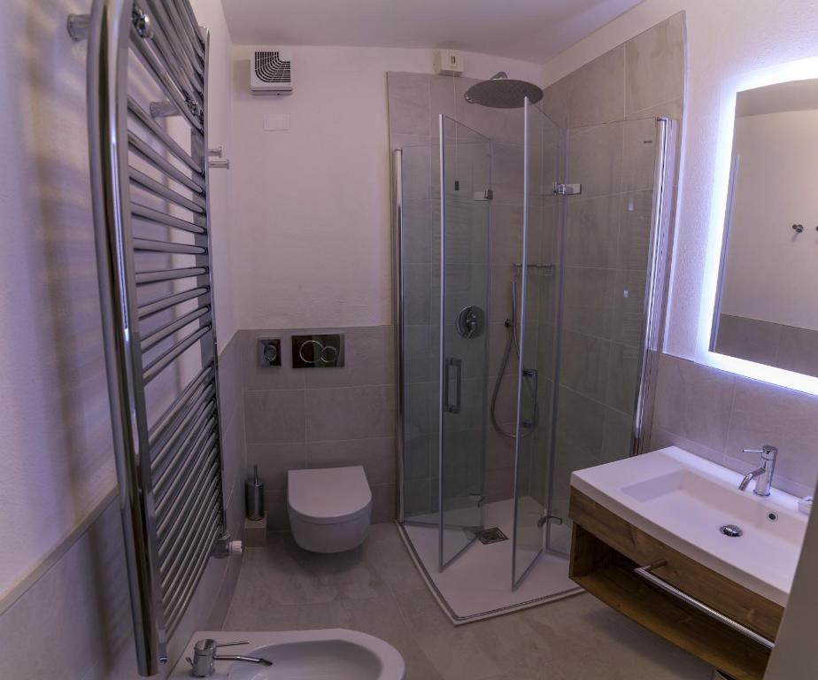 Koupelna v ubytování Hotel Tre Pini