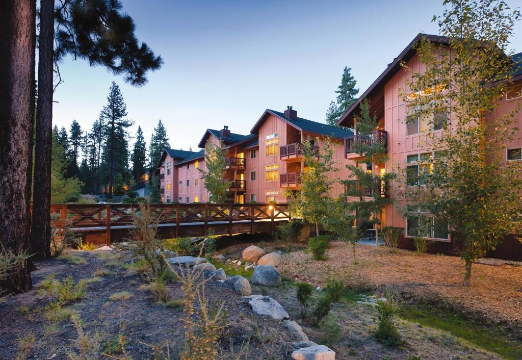 a hotel with a bridge over a river at WorldMark South Shore in Zephyr Cove