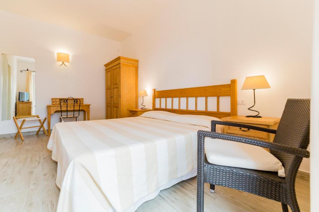 Postel nebo postele na pokoji v ubytování Villa Brigida
