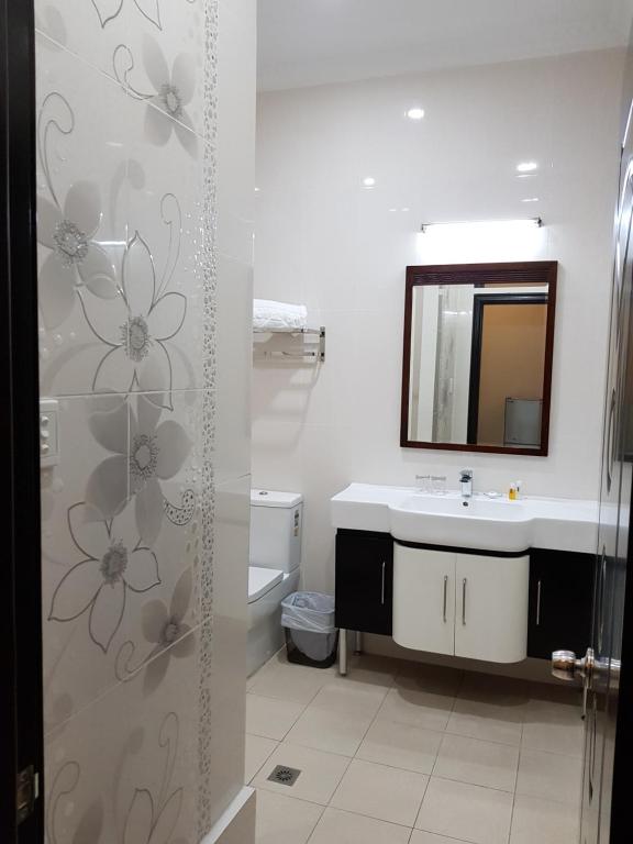 Koupelna v ubytování Lae City Hotel