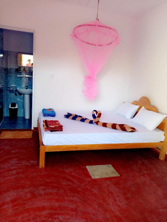 Postel nebo postele na pokoji v ubytování U new guest house
