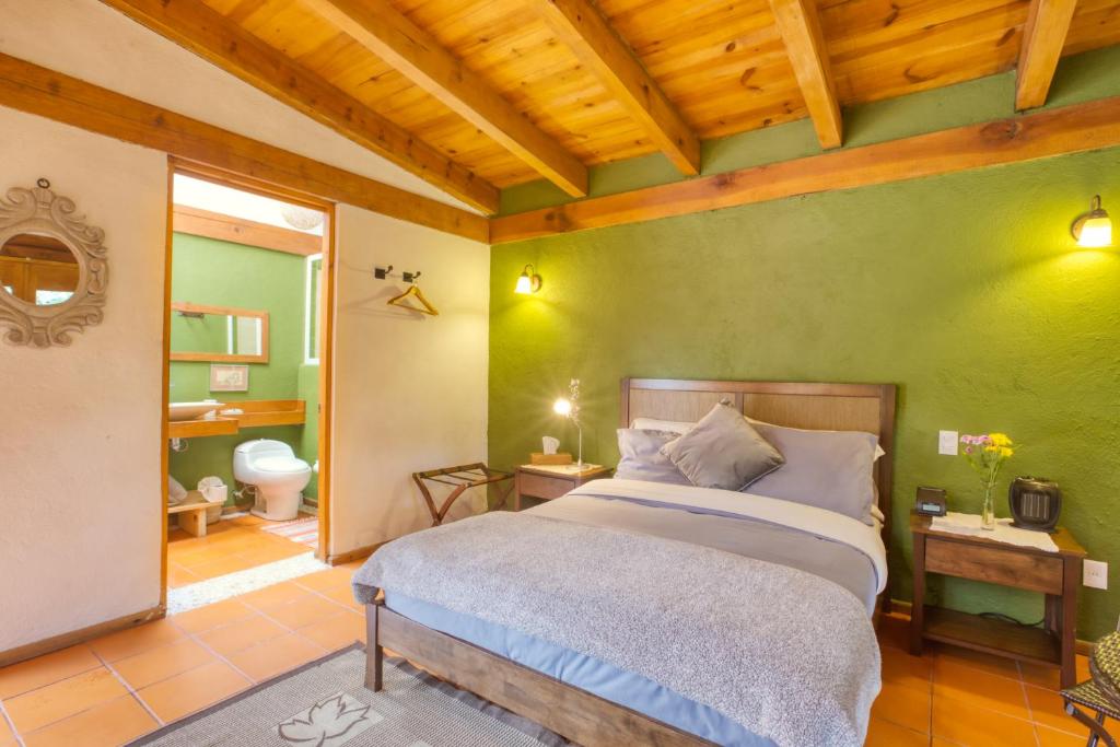 Cama o camas de una habitación en La Joya del Viento