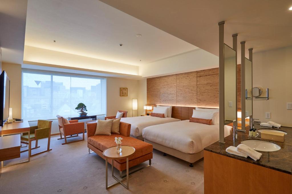 Postel nebo postele na pokoji v ubytování THE KITANO HOTEL TOKYO