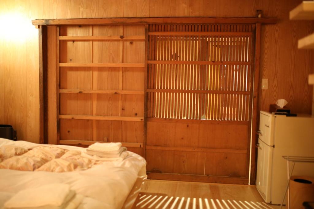Postel nebo postele na pokoji v ubytování 無鹿リゾート