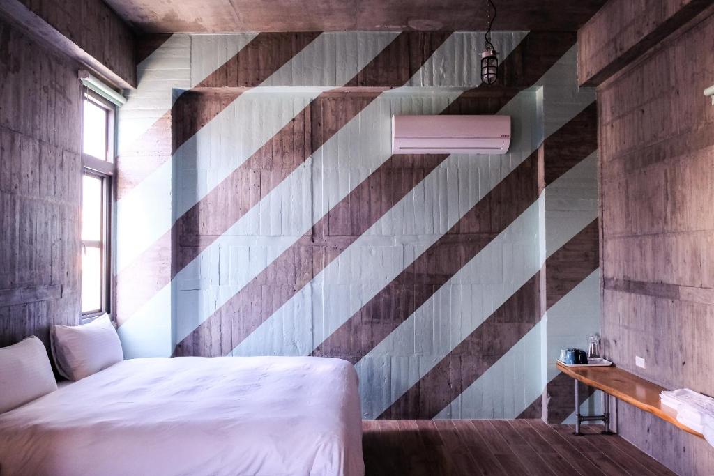 Postel nebo postele na pokoji v ubytování Relaxing Hotel