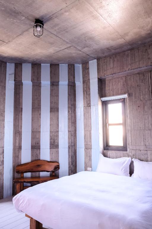 Postel nebo postele na pokoji v ubytování Relaxing Hotel