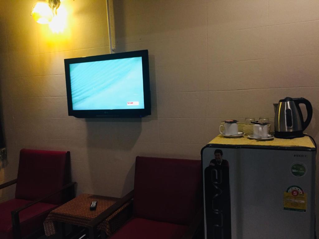 Příslušenství pro přípravu čaje a kávy v ubytování Nett Hotel