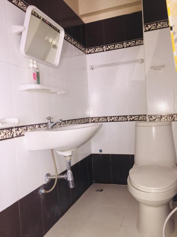 Koupelna v ubytování Nett Hotel