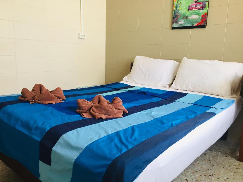 Postel nebo postele na pokoji v ubytování Nett Hotel