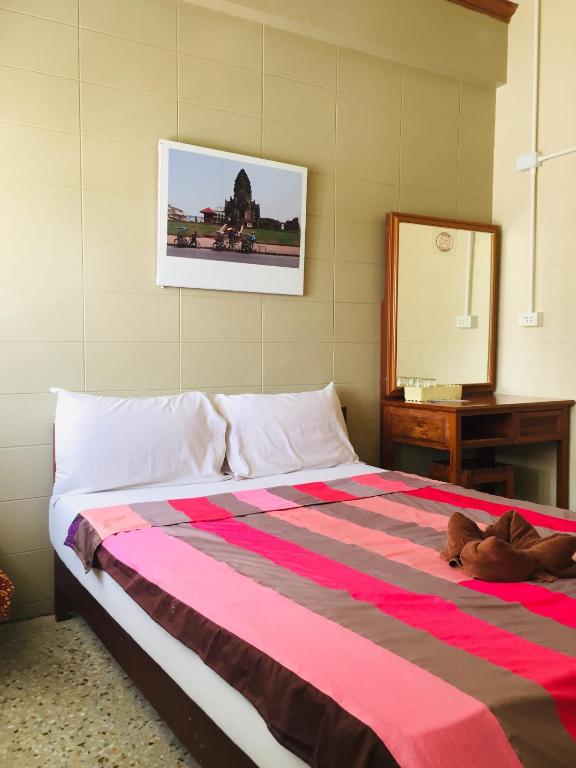 Postel nebo postele na pokoji v ubytování Nett Hotel