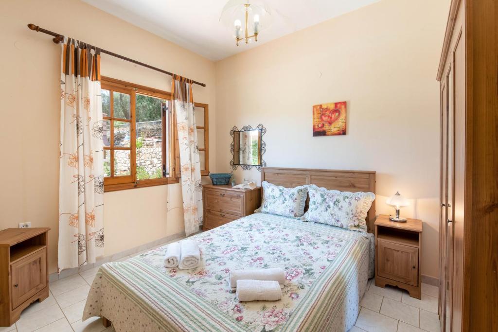 Postel nebo postele na pokoji v ubytování Voula Apartments