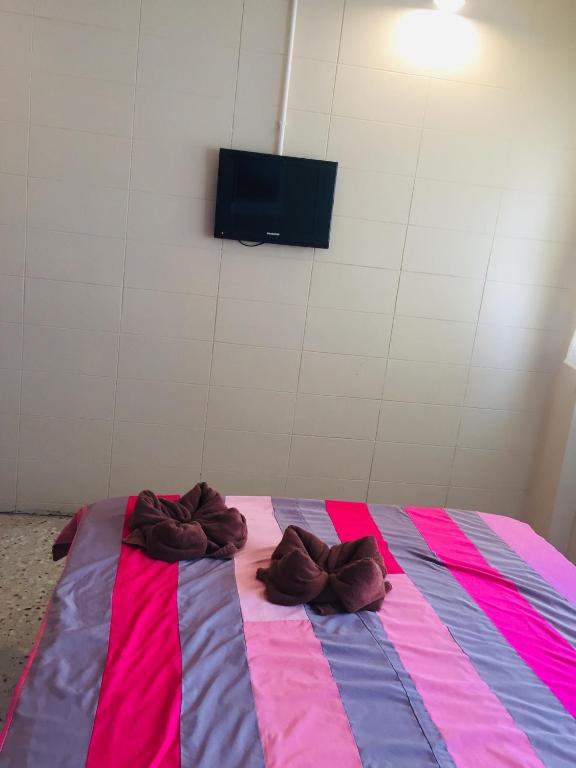 Postel nebo postele na pokoji v ubytování Nett Hotel