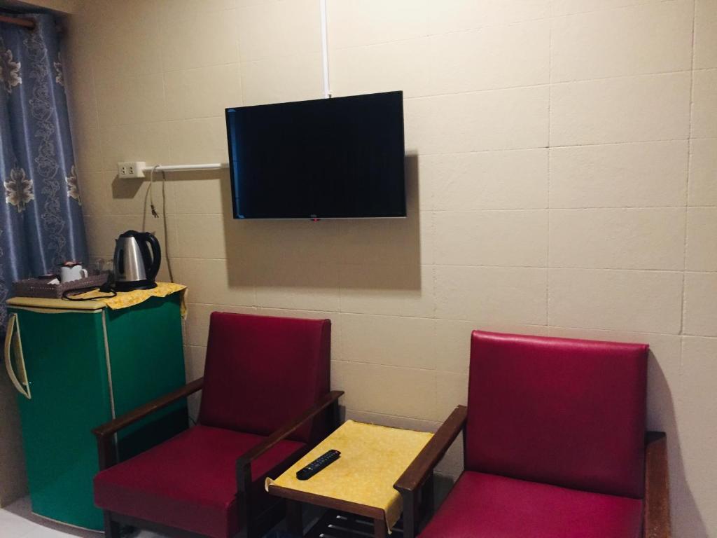 TV a/nebo společenská místnost v ubytování Nett Hotel