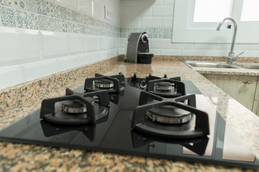 Kuchyň nebo kuchyňský kout v ubytování CUNIT HOME