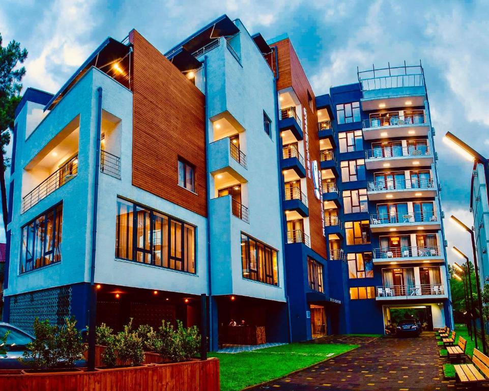 a large building with many windows at Resolute Shekvetili Hotel in Shekhvetili