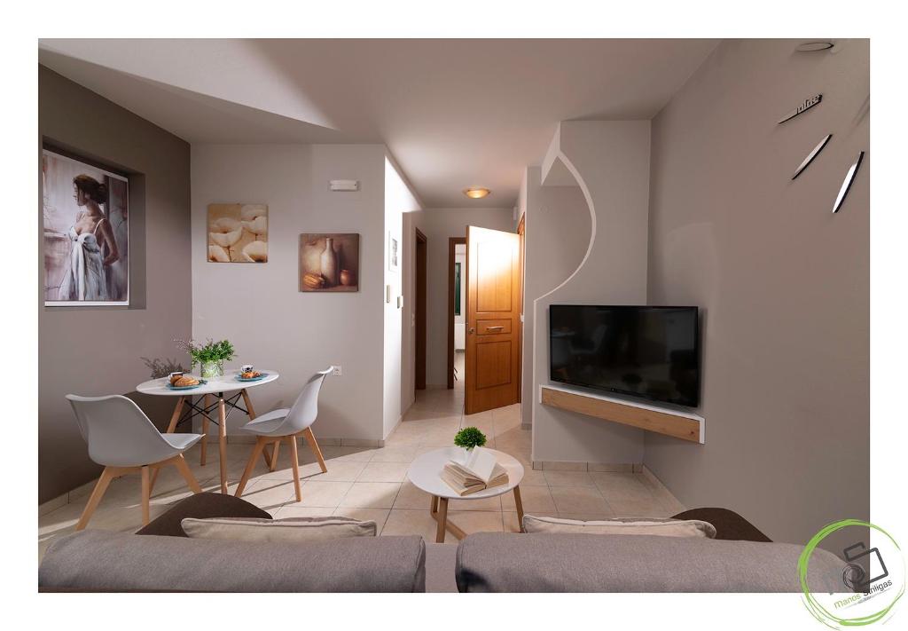 A television and/or entertainment centre at Irini Apartment Piskopiano, Hersonissos #2