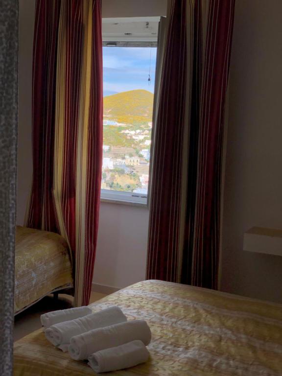 Postel nebo postele na pokoji v ubytování Villa Adele Ponza