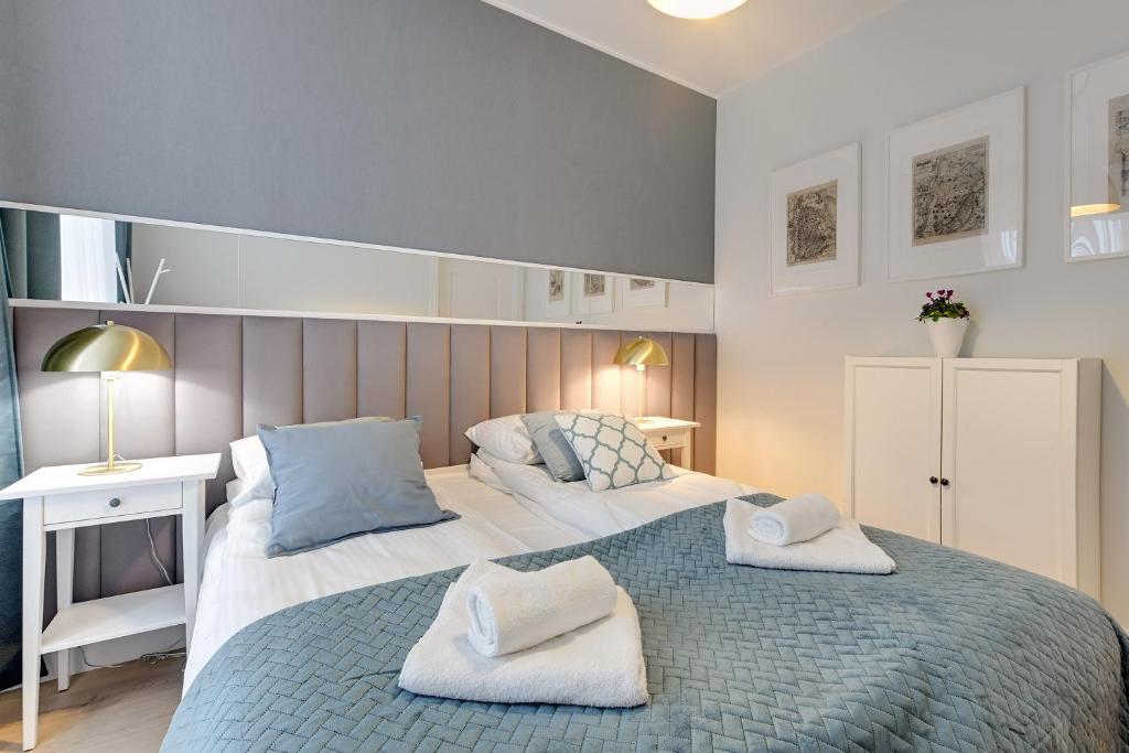 Postel nebo postele na pokoji v ubytování Comfort Apartments Rajska
