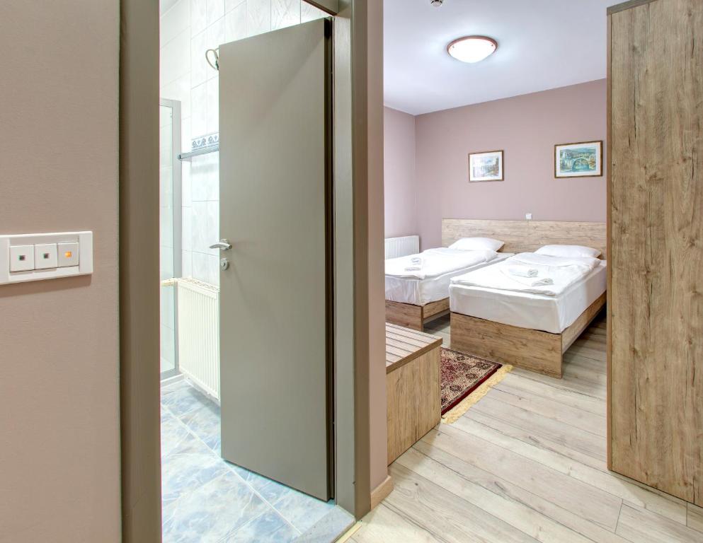Postel nebo postele na pokoji v ubytování Motel MontaNaro