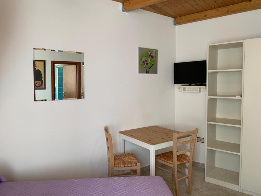 TV a/nebo společenská místnost v ubytování B&B S'Incontru