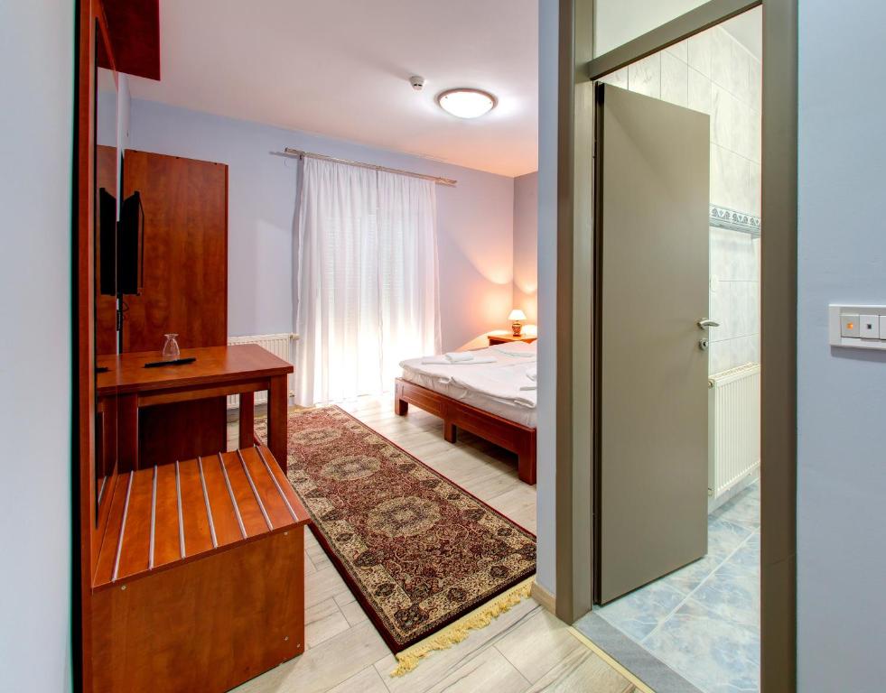 Postel nebo postele na pokoji v ubytování Motel MontaNaro