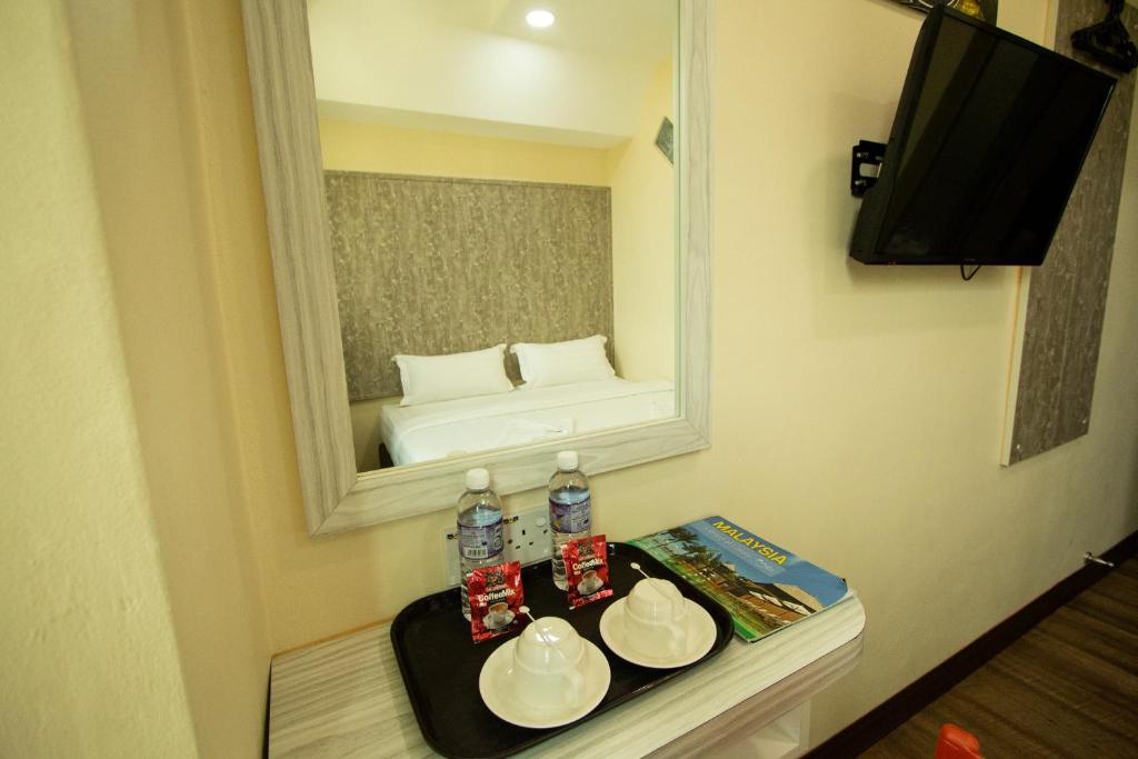 Postel nebo postele na pokoji v ubytování Expo Hotel