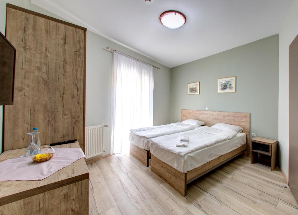 Postel nebo postele na pokoji v ubytování Motel MontaNaro