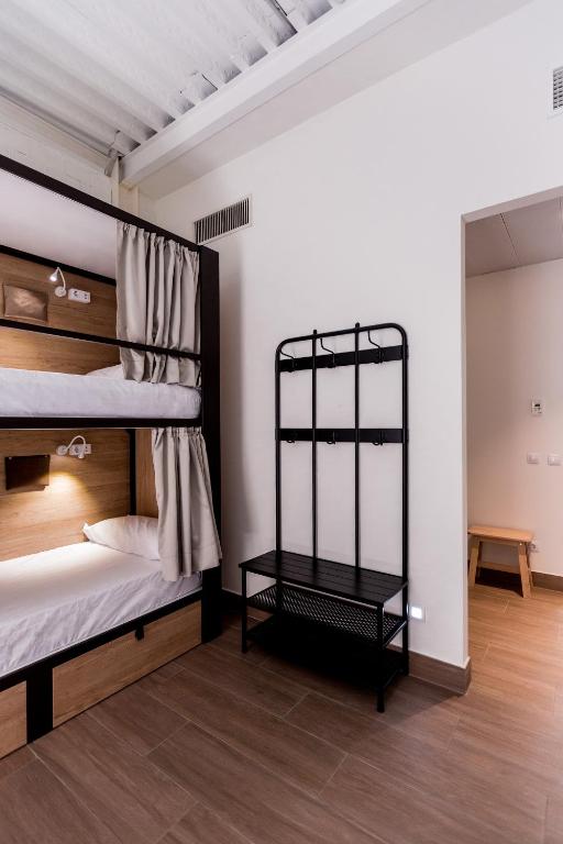 Postel nebo postele na pokoji v ubytování Hostel Nüt