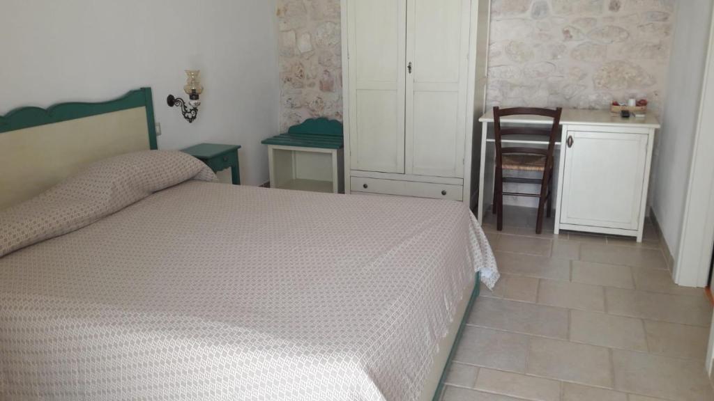 Postel nebo postele na pokoji v ubytování B&B Il Mulino del Monastero