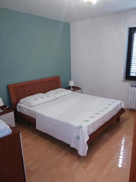 Postel nebo postele na pokoji v ubytování Bed & Breakfast Banjole