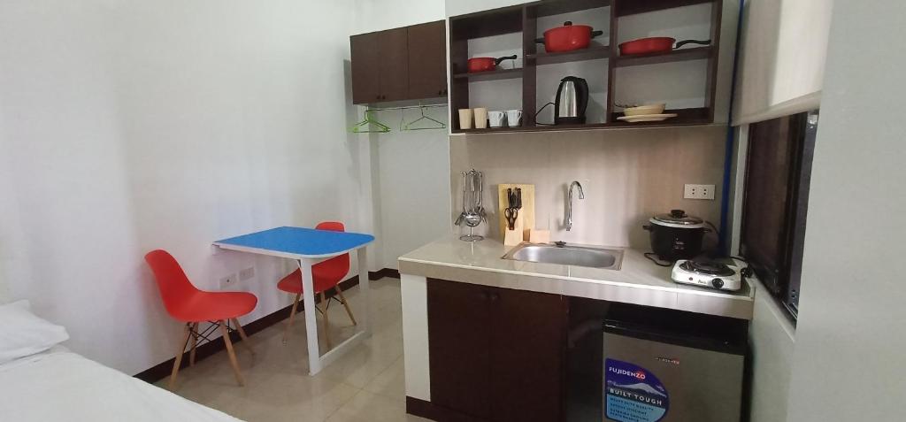 Kuchyň nebo kuchyňský kout v ubytování Clark-Pad Inn, Angeles City