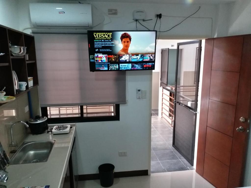 TV a/nebo společenská místnost v ubytování Clark-Pad Inn, Angeles City