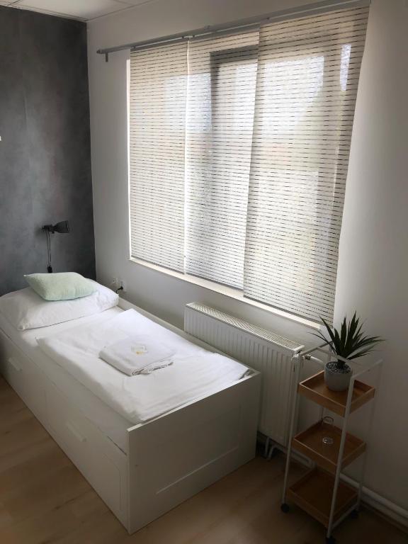 Postel nebo postele na pokoji v ubytování Hotel Gregor