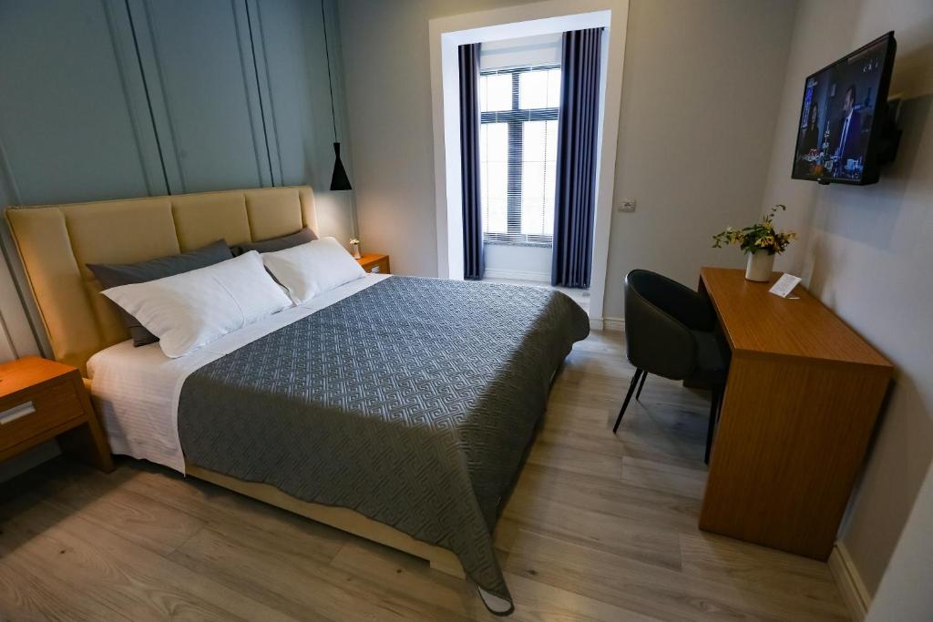 Postel nebo postele na pokoji v ubytování Home Hotel