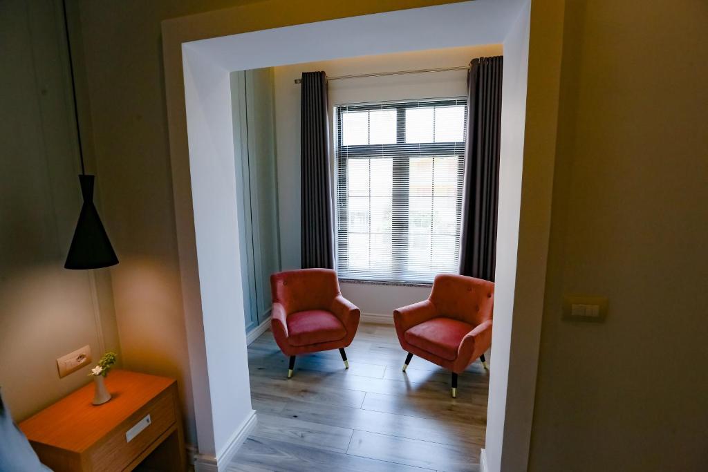 Posezení v ubytování Home Hotel
