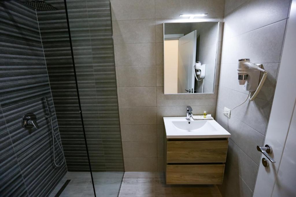 Koupelna v ubytování Home Hotel