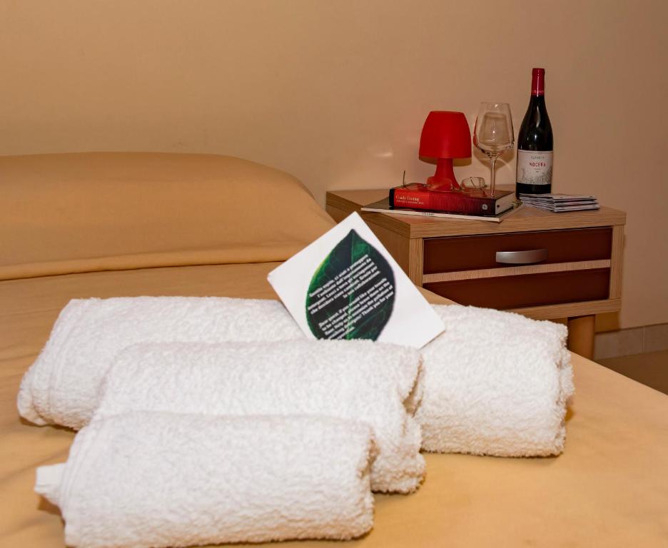 Postel nebo postele na pokoji v ubytování Hotel Milomax