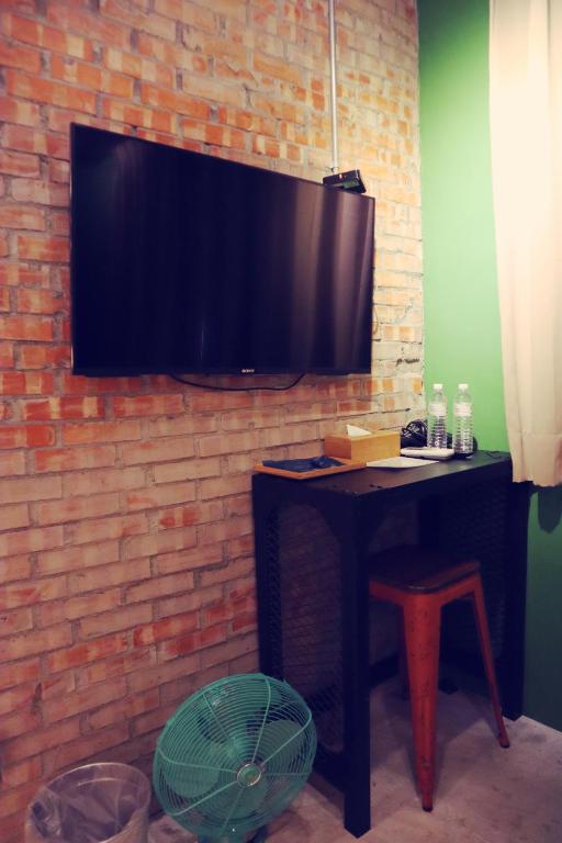 TV a/nebo společenská místnost v ubytování 旅充人文 Travel Charger Hostel