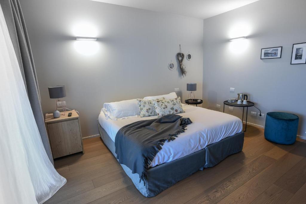 Postel nebo postele na pokoji v ubytování Agriturismo Le Piccole Macìe