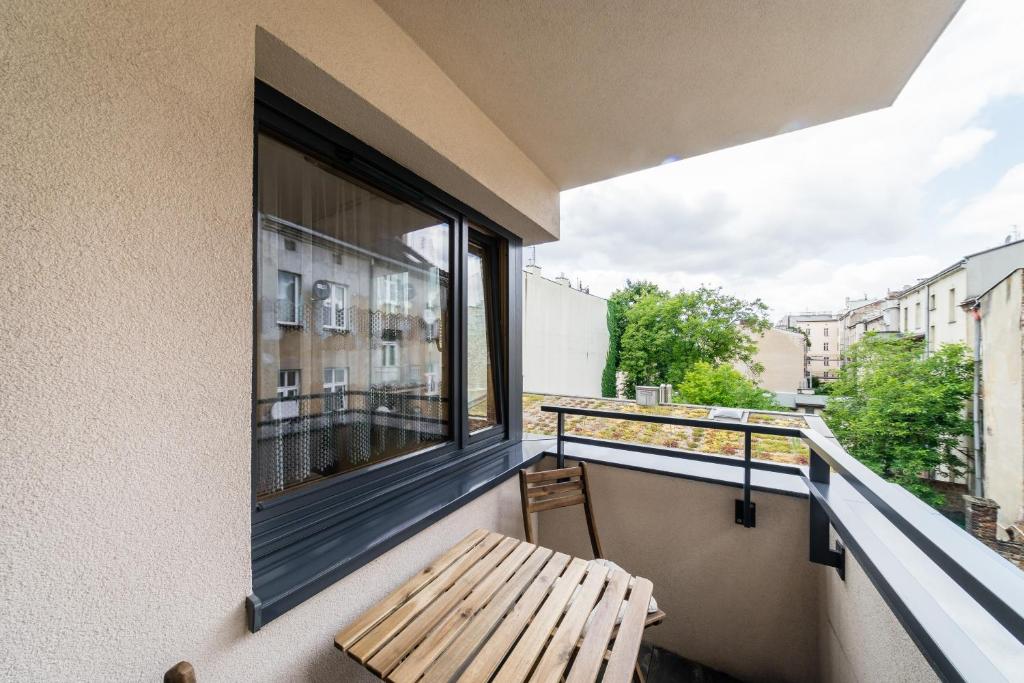 Balkón alebo terasa v ubytovaní Apartament Rakowicka 14 Deluxe Old Town WAWELOFTS