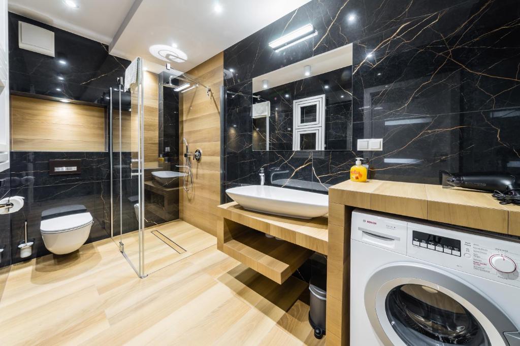 Kúpeľňa v ubytovaní Apartament Rakowicka 14 Deluxe Old Town WAWELOFTS