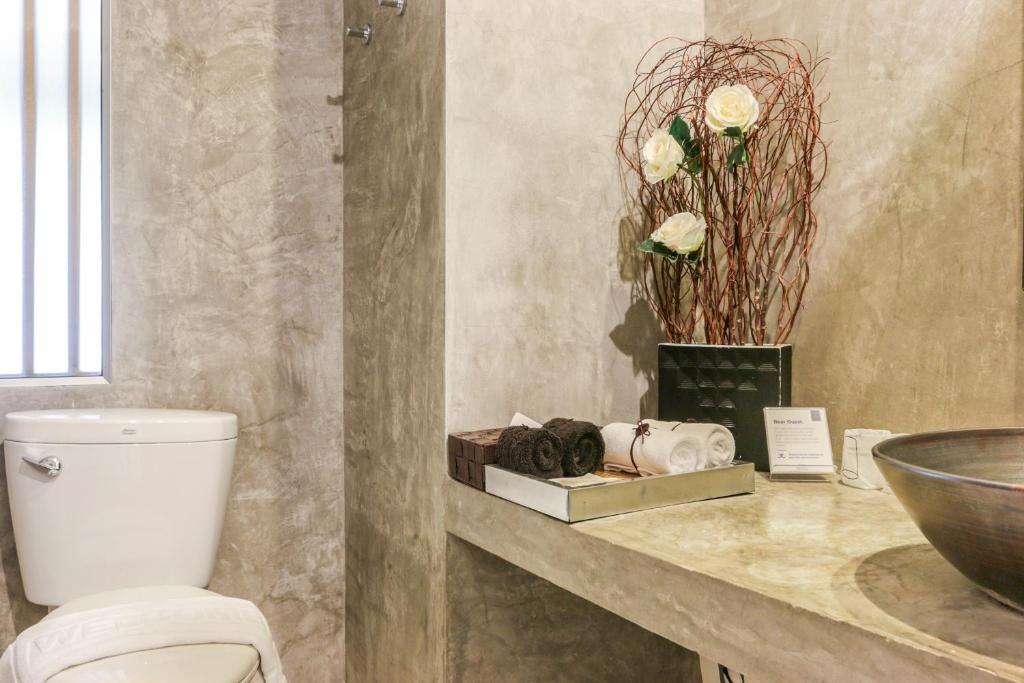 Koupelna v ubytování Ketawa Pet Friendly Hotel