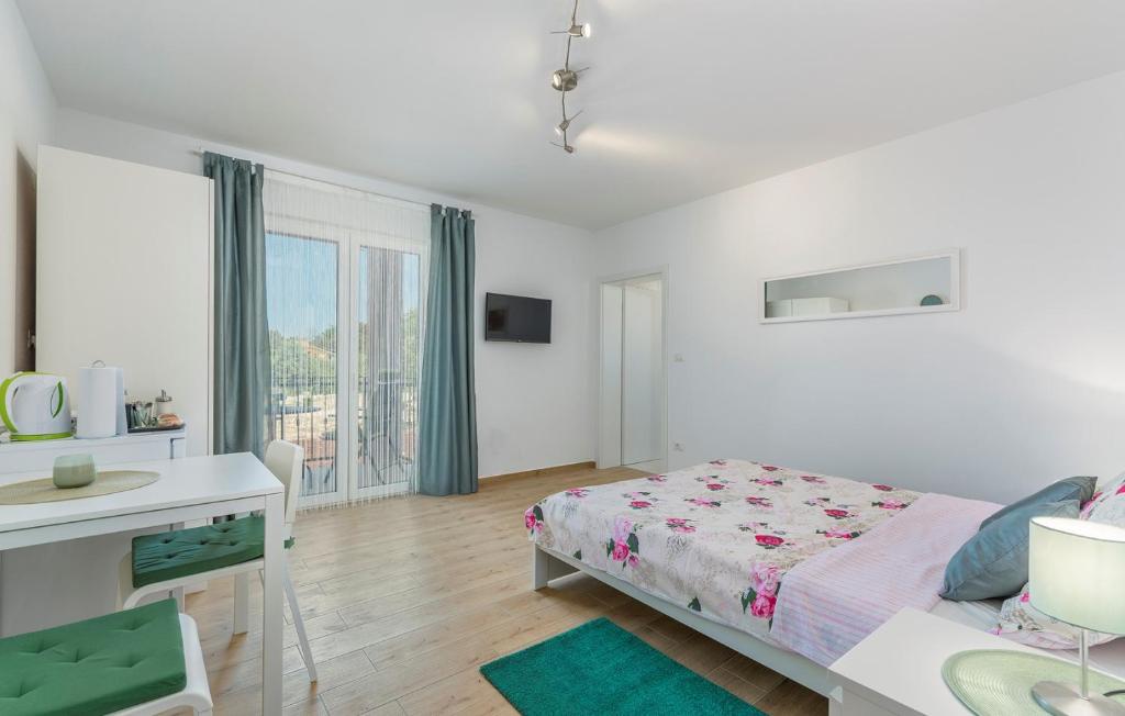 Postel nebo postele na pokoji v ubytování Apartment Complex Jelena