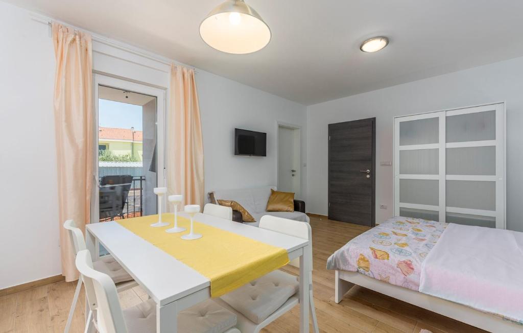 Postel nebo postele na pokoji v ubytování Apartment Complex Jelena
