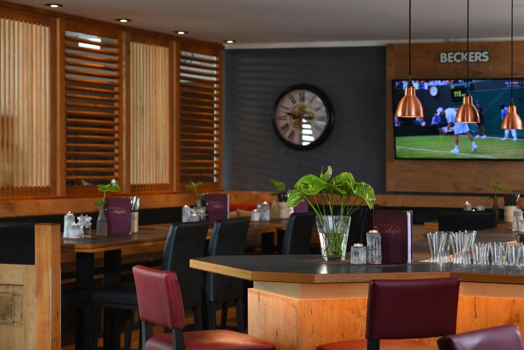 TV a/nebo společenská místnost v ubytování Landhotel Schnuck