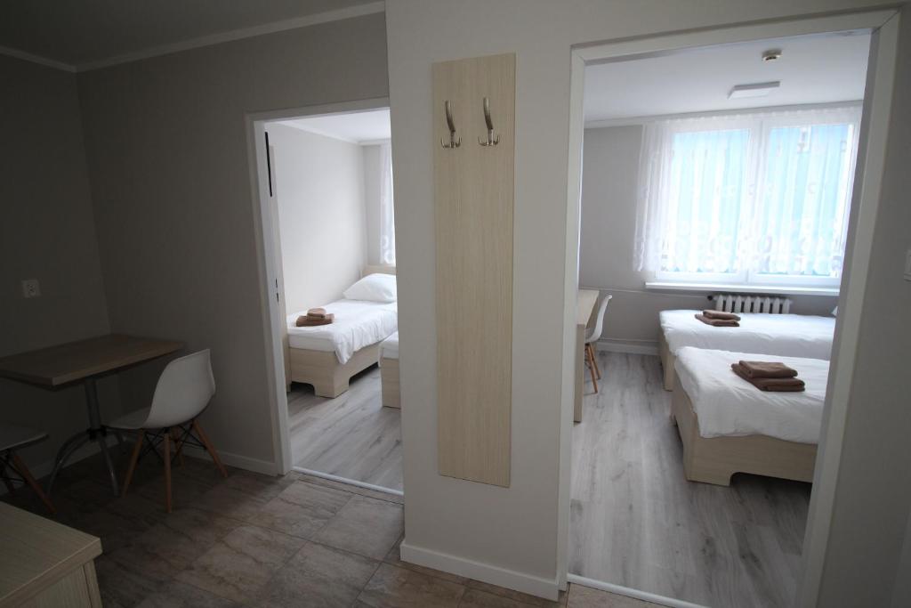 Pod Kominem Pokoje i Apartamenty - Habitación De Lujo Cuádruple