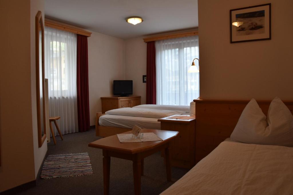 Postel nebo postele na pokoji v ubytování Garni Haus Tyrol